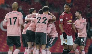 Hasil Liga Inggris, Manchester United dipermalukan Sheffied dengan skor 1-2 di Old Trafford pada pekan ke-20 EPL, Kamis dini hari WIB. Suka cita pemain Sheffield. (Twitter@sheffieldunitedl)