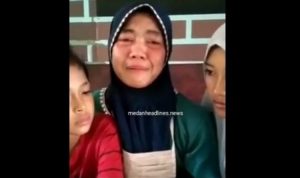 Tangkapan layar video penjelasan istri tersangka kasus penganiayaan pedagang di Pasar Gambir