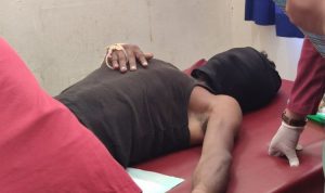 Temianus Magayang (wajah ditutup)