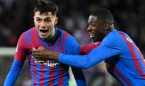 Pedri berselebrasi usai mencetak gol ke gawang Sevilla di Camp Nou