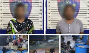 Dua orang diduga pelaku dan barang bukti BBM subsidi pertalite yang disita penggerebekan. (Kalimantanlive.com/Ilham)