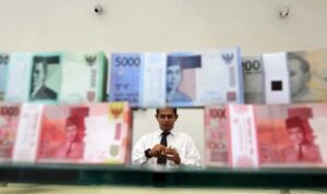 Ilustrasi—Skema Tadpole P2P Lending: solusi atau jebakan finansial? Cek pinjol resmi OJK.