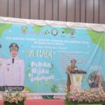 Asisten II bidang Perekonomian dan Pembangunan Sekretariat Daerah Balangan saat menyampaikan sambutan Bupati Balangan dalam Pekan Hijau di Balangan, Selasa (10/1/2026). (Kalimantanlive.com/Kamil)